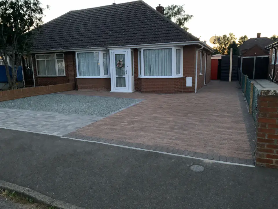 Completed LB Services driveway with gravel and two complementary block-paving finishes