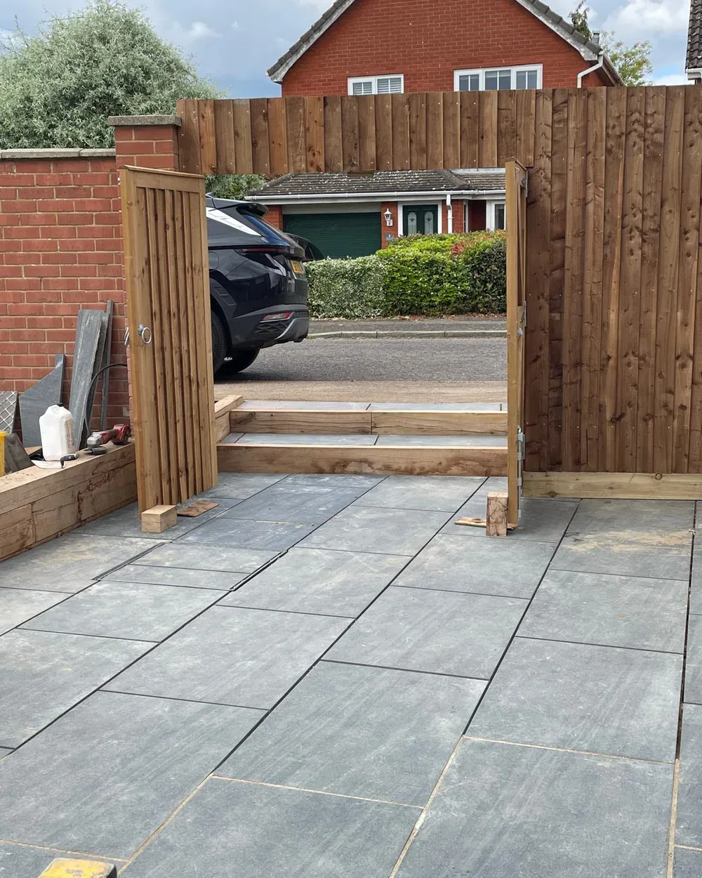 New timber gate and paved garden entrance nearing completion